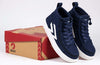 Navy/White BILLY CS 1.0 Sneaker High Tops for kids with easy on/off laces and zipper, placed next to branded box.