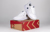 White/Navy BILLY Sport Court sneakers for kids on red box. Easy on/off, laces and zipper. Functional and fashionable footwear.