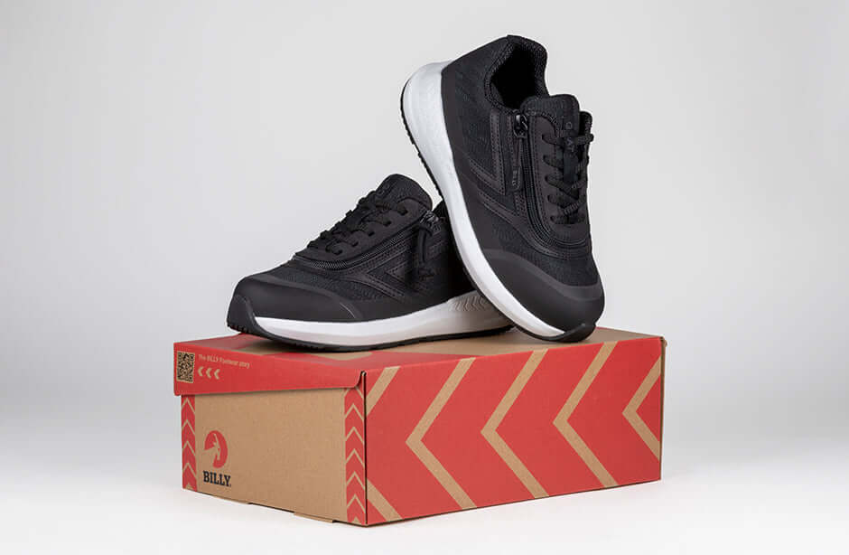 Black BILLY Goat AFO-Friendly shoes for men, with orthopedic zipper, displayed on a shoebox, ideal for wide feet and ankle support.